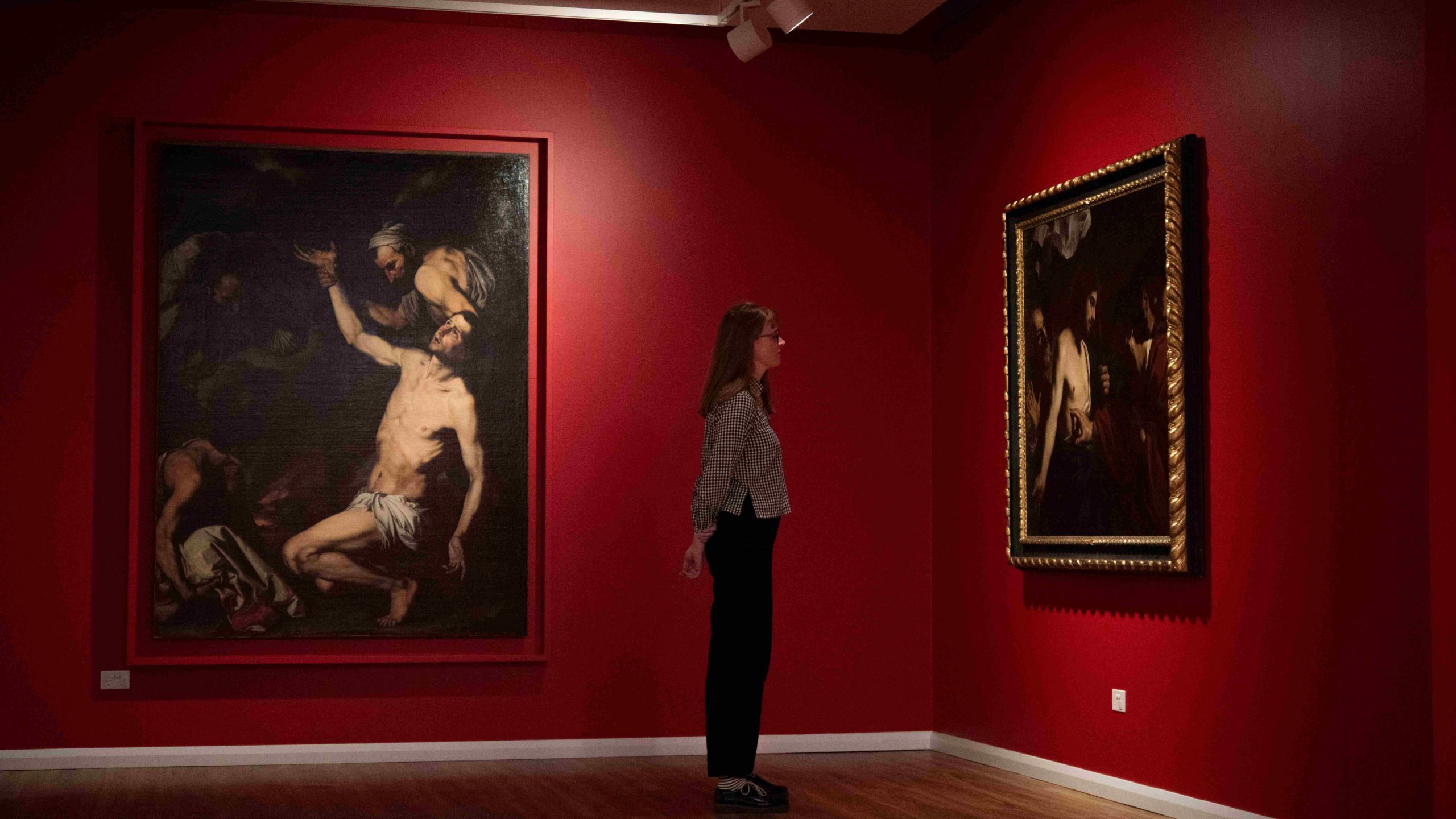 L-R_ Martyrdom of Saint Lawrence by Jusepe de Ribera and Doubting of Thomas by Giovanni Francesco Barbieri (il Guercino)_as part of Emerging From Darkness_ Faith, Emotion and The Body in the Baroque 
